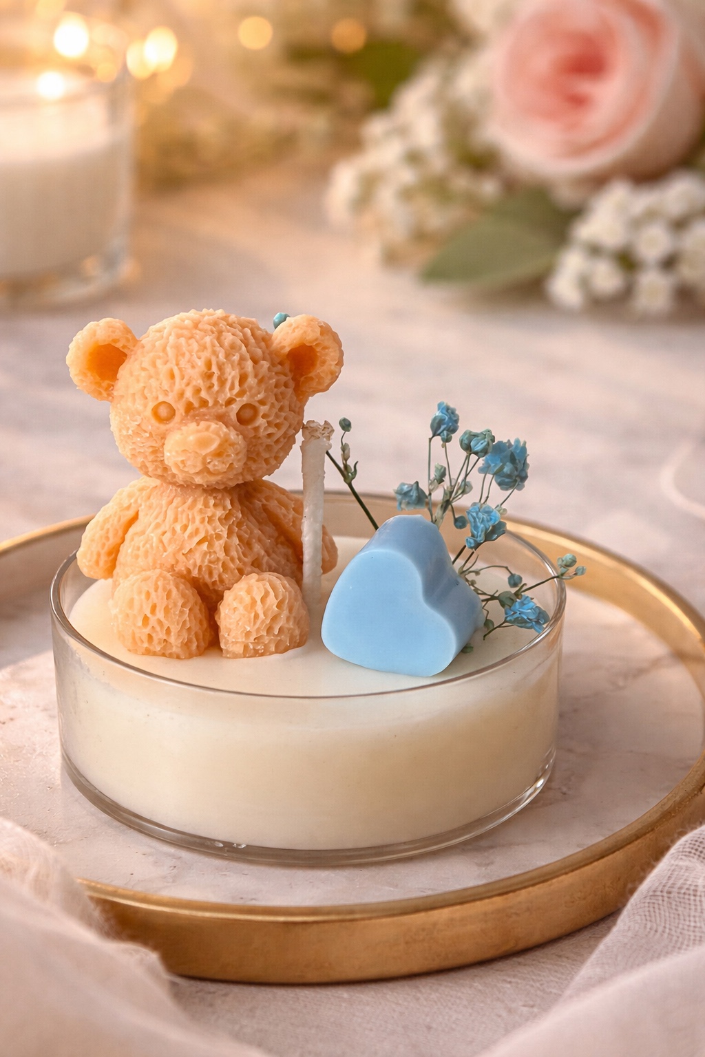 Teddy topper candle in a glass bowl
